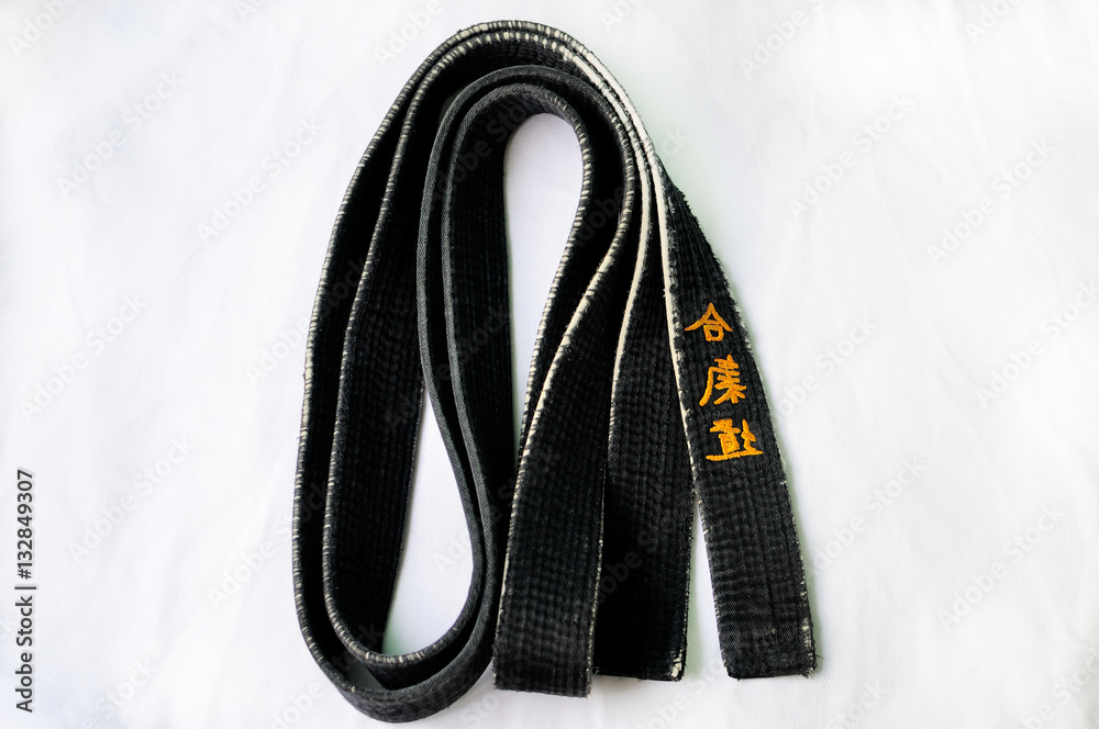 Black belt.The belt of three Japanese characters of traditional