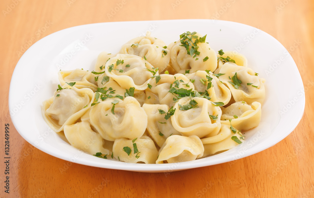 homemade boiled dumplings on a plate homemade boiled dumplings on a plate