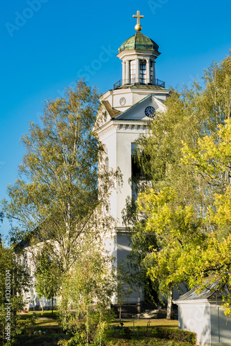 Autumn view of a white Stone church in Fagersta Sweden