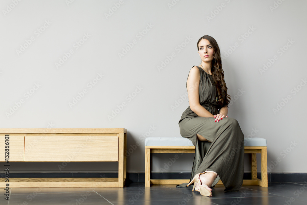 Young woman posing in the room Young woman posing in the room