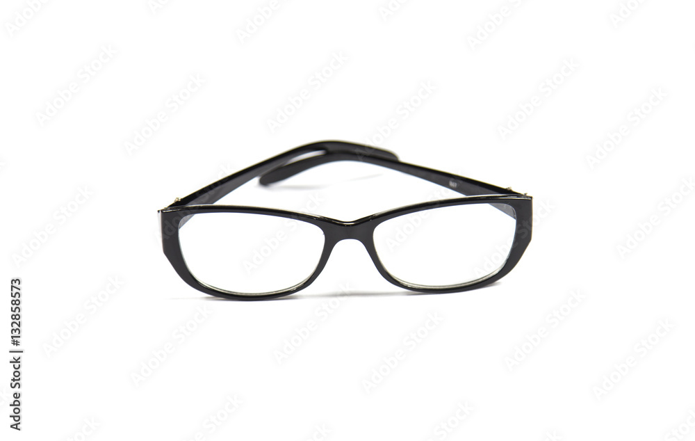 eyeglasses and notebook on wood background, black and white with
