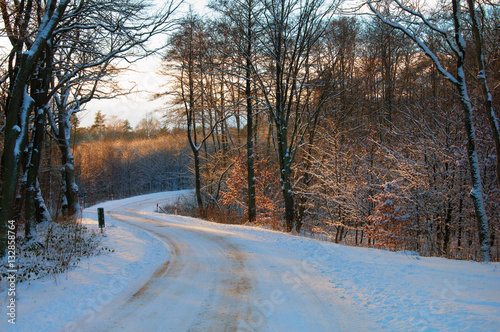 Country road covered with snow in winter