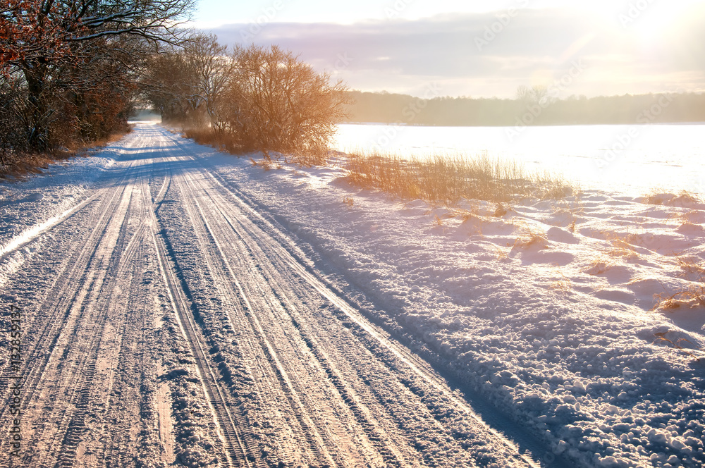 Country road covered with snow in winter Country road covered with snow in winter