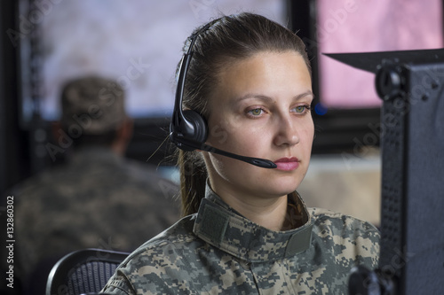 фотографія Female drone operator working at computer