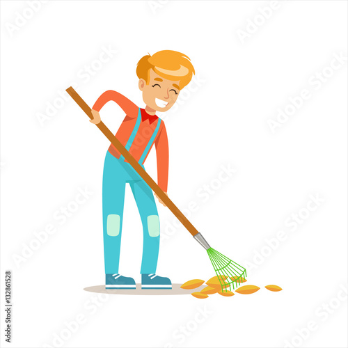 Boy Raking Fallen Autumn Leaves Helping In Eco-Friendly Gardening Outdoors Part Of Kids And Nature Series
