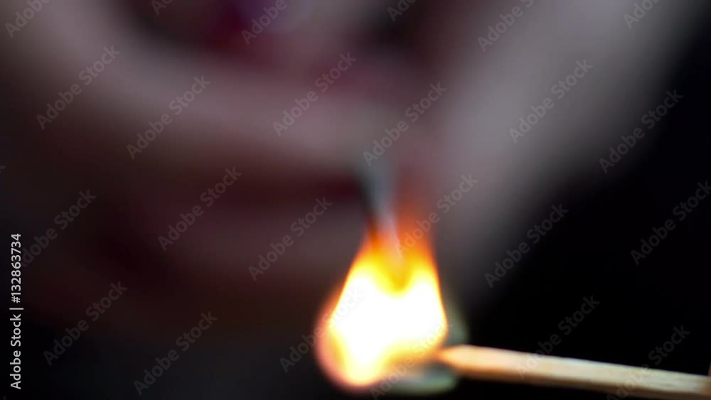 Man holding bright festive Christmas sparkler in hand