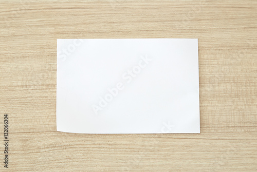 white blank paper on wood