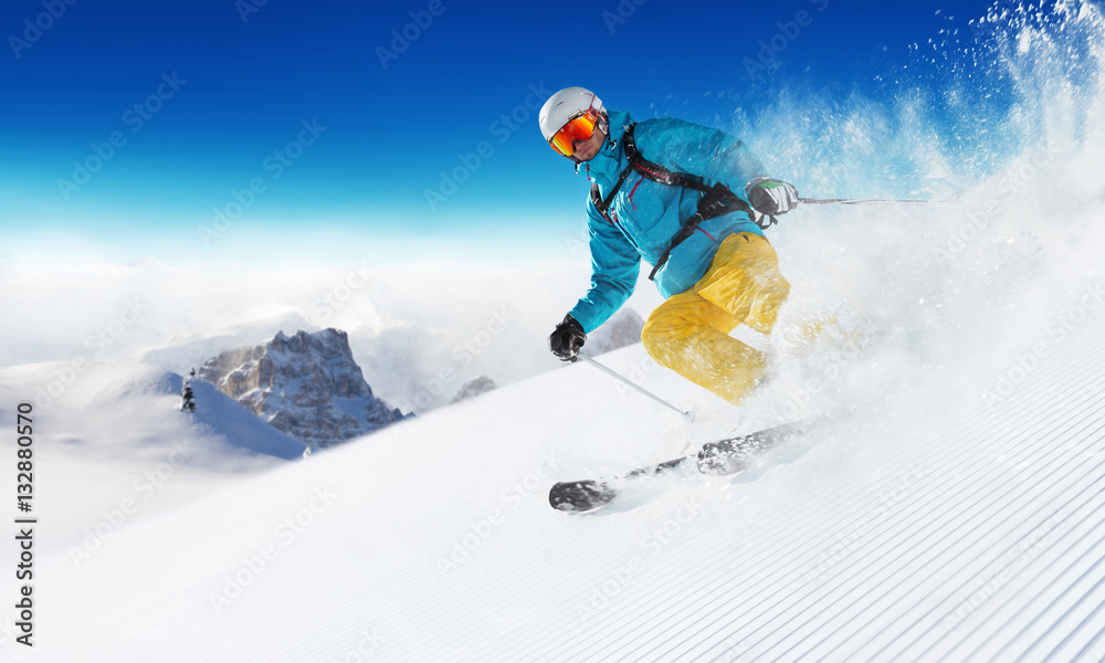 Skier on piste running downhill - obrazy, fototapety, plakaty 