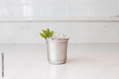 Mint julep cocktail in silver glass
