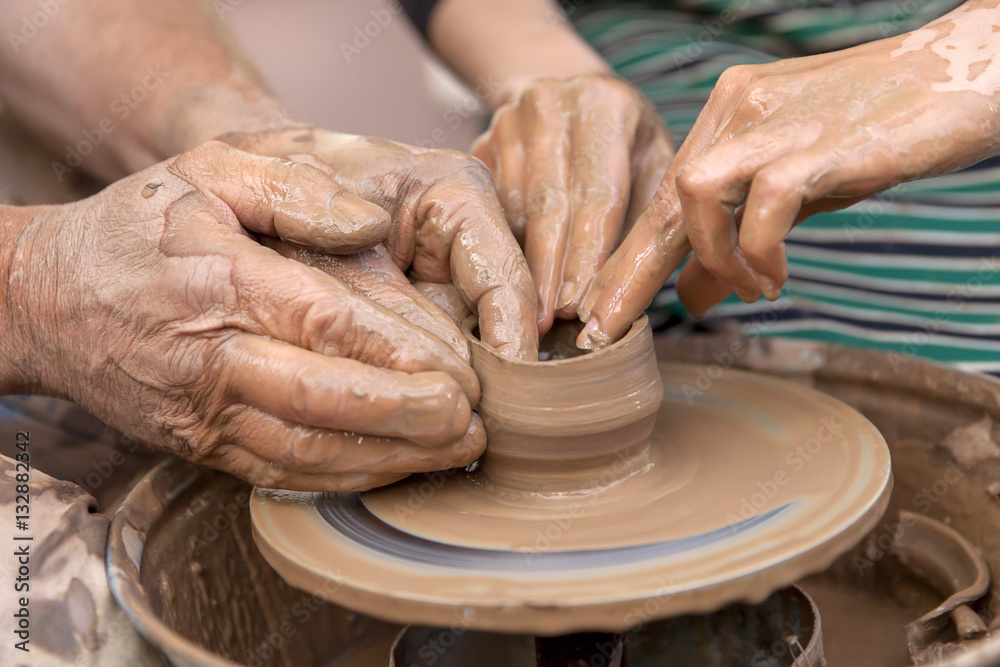 Pottery making, close up on hands