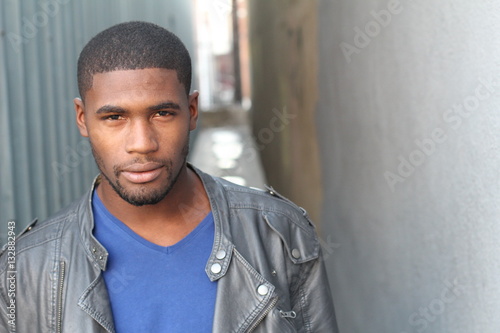 Close-up of handsome young, dark-skinned man