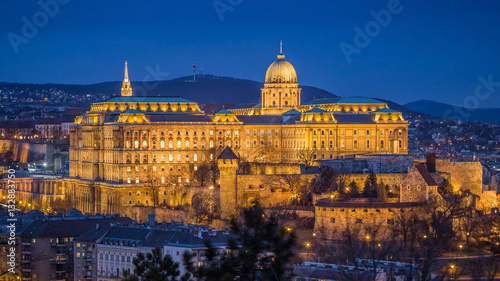 Budapest, Hungary - The beautiful Buda Castle (Royal Palace) as seen from Gellert Hill illuminated in winter time at blue hour