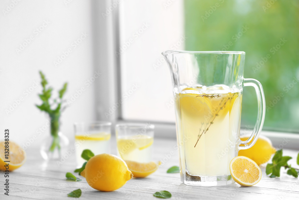 Cold fresh lemonade on windowsill Cold fresh lemonade on windowsill
