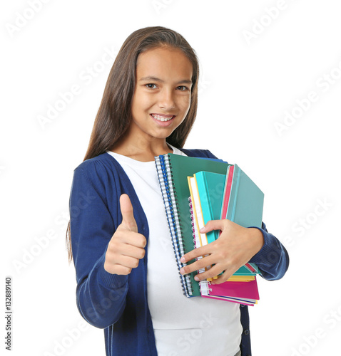 Cute schoolgirl on white ba...