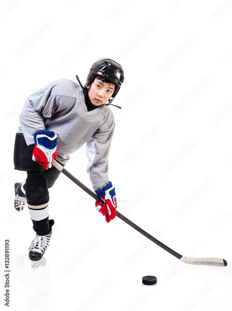 Obraz premium Junior Ice Hockey Player Isolated on White Background