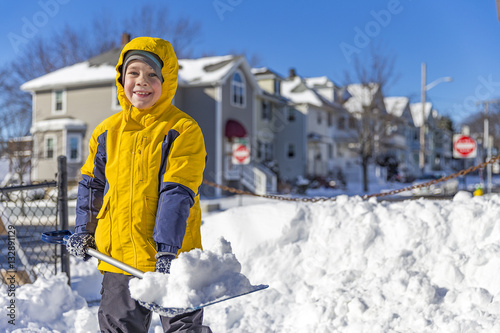 Wall Mural boy enjoys the snow removal