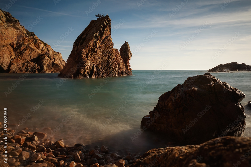 Wild rocky beach in sintra cascais natural park in Portugal