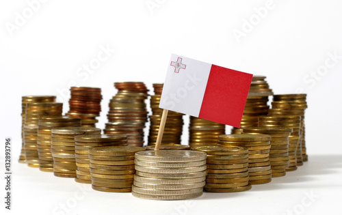 Malta flag waving with stack of money coins