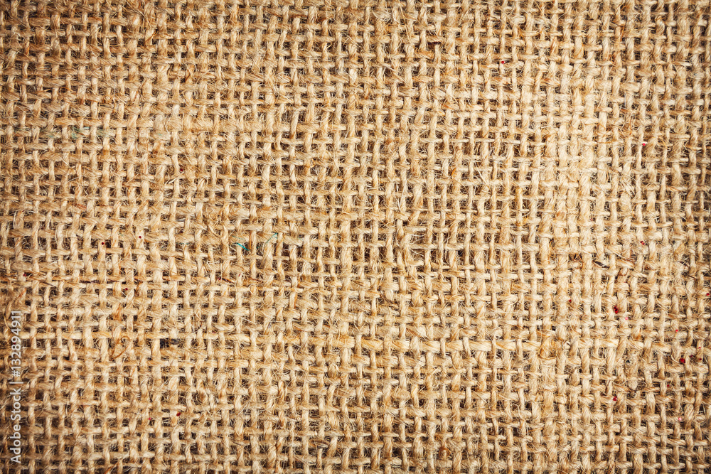 Textured background of a brown burlap bag, close up Textured background of a brown burlap bag, close up