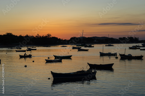 Boats at the sunset photo