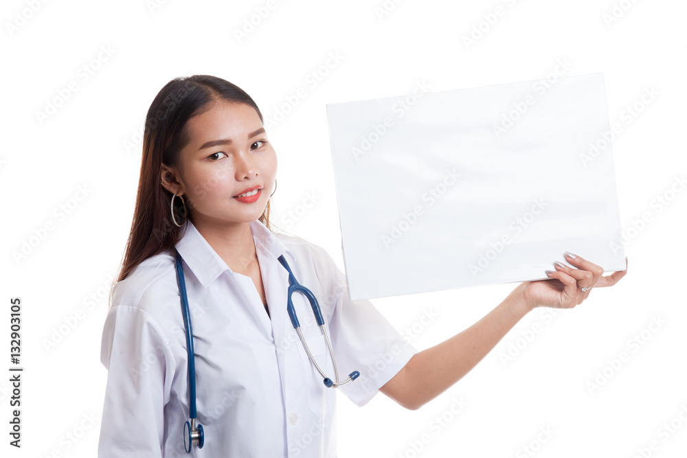Young Asian female doctor show a blank sign. Young Asian female doctor show a blank sign.