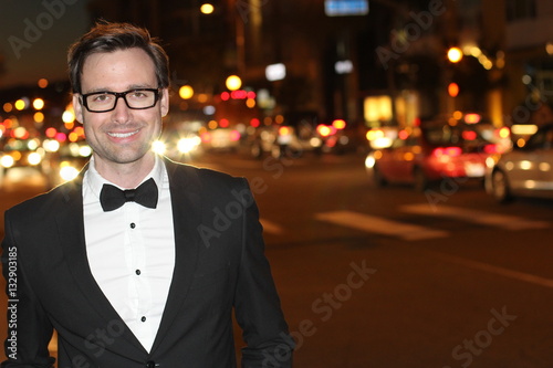 Modern businessman with glasses in the city- Stock image