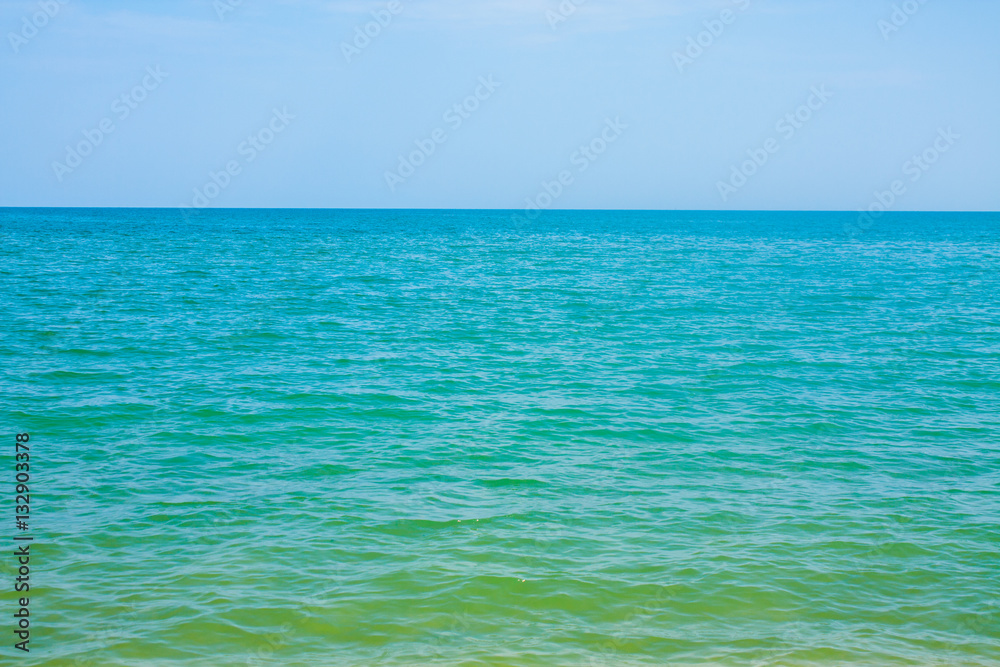 Adriatic Sea coast view. Seashore of Italy, summer sandy beach with clouds on horizon. Adriatic Sea coast view. Seashore of Italy, summer sandy beach with clouds on horizon.