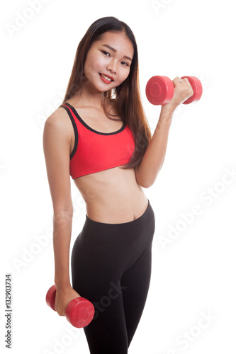 Beautiful Asian healthy girl exercise with dumbbell.