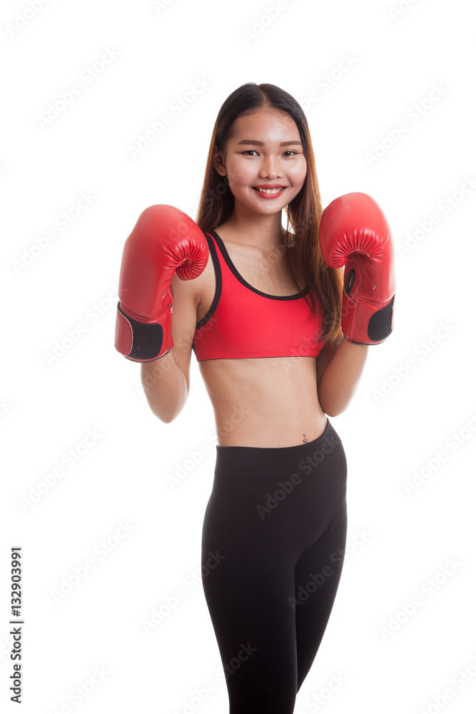 Beautiful healthy Asian girl with red boxing glove.