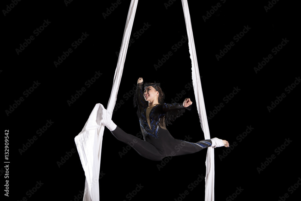 Young woman circus air gymnast Young woman circus air gymnast
