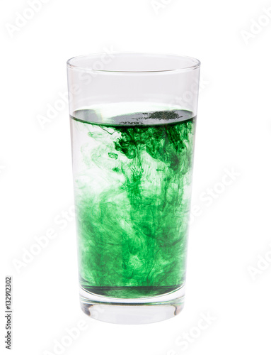 chlorophyll in glass isolated on white background