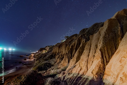Night skies and stars over the cliffs at El Matador state Beach near Malibu California