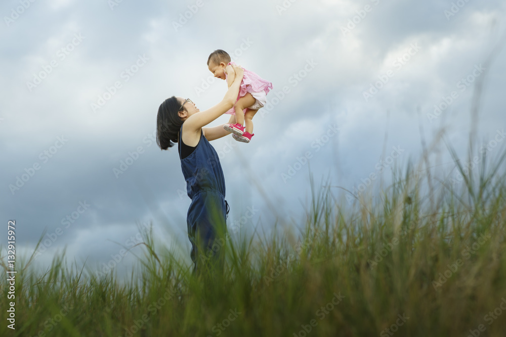 Happy young family spending time outdoor on a summer day - Vibra Happy young family spending time outdoor on a summer day - Vibra