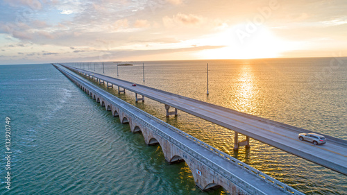 Overseas Highway Seven Mile Bridge Traffic at Sunrise. View From Florida Keys Tropical Road to Paradise © CascadeCreatives