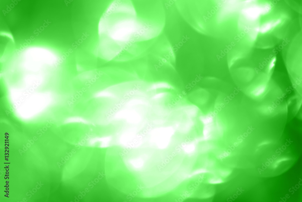 Obraz premium Magic background with green bokeh.
