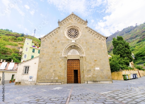 Manarola town, Riomaggiore, La Spezia province, Liguria, northern Italy. The San Lorenzo church facade, monument landmark. Part of the Cinque Terre National Park and a UNESCO World Heritage Site.