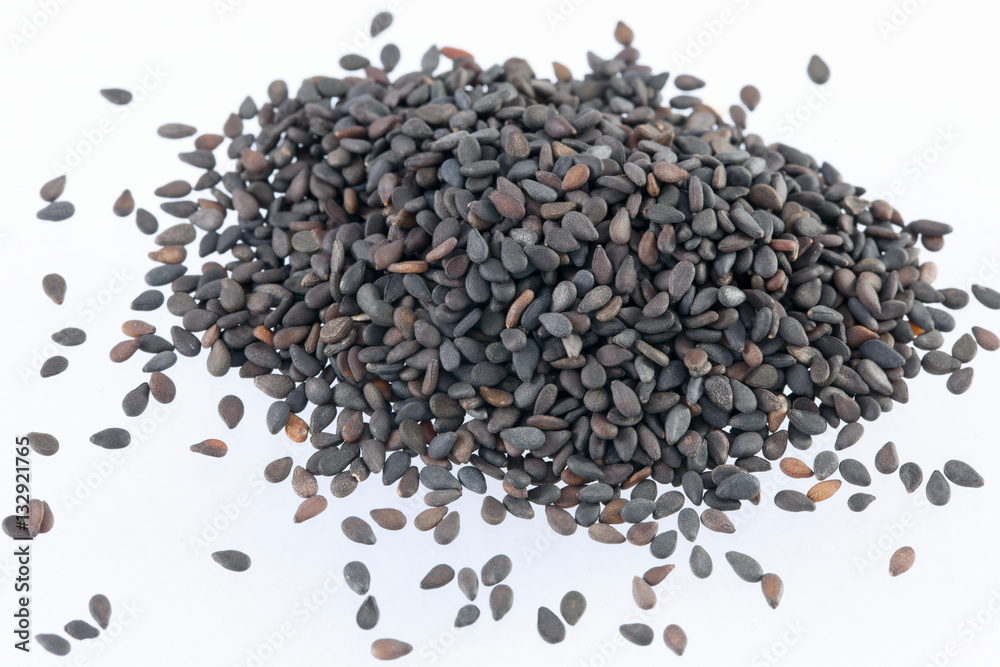 Pile of black sesame seeds isolated on white background Pile of black sesame seeds isolated on white background