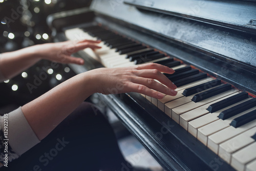 Her hands on the keyboard piano vintage