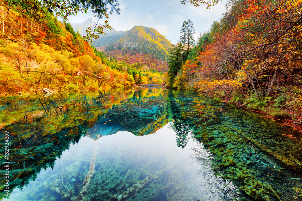 Beautiful view of the Five Flower Lake among fall woods Beautiful view of the Five Flower Lake among fall woods