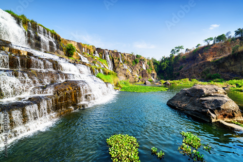 Fototapeta Naklejka Na Ścianę i Meble -  Amazing view of natural cascading waterfall with clear water