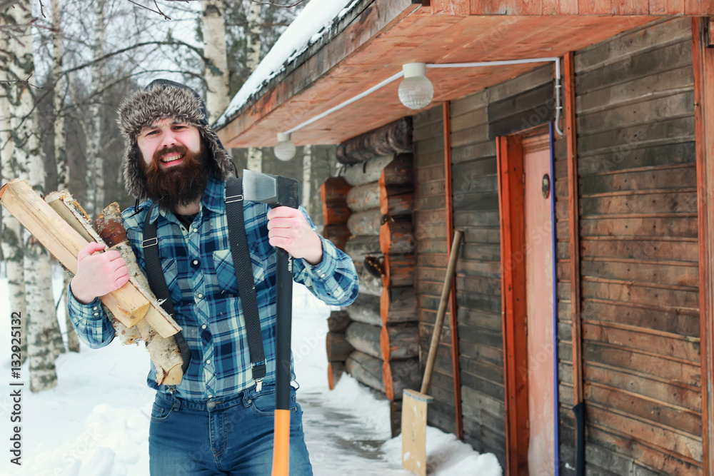 man in winter with axe man in winter with axe