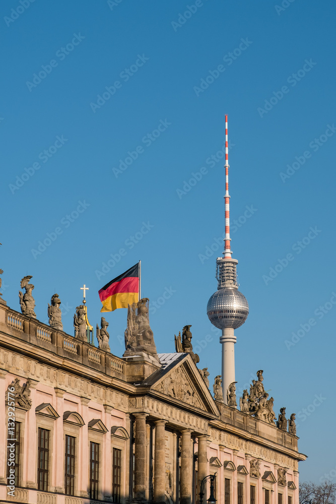 Obraz premium Berlin, Tv tower ,historic building (Zeughaus) and german flag