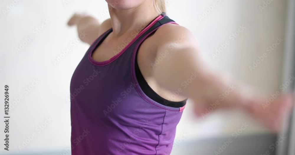 Young adult female doing yoga at home Young adult female doing yoga at home