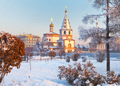 Russia. Irkutsk. View of the Cathedral of the Epiphany from the city park in a cold winter day