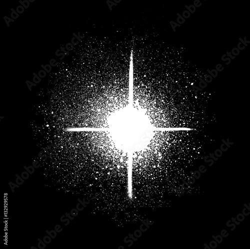 graffiti sprayed star shape in white on black