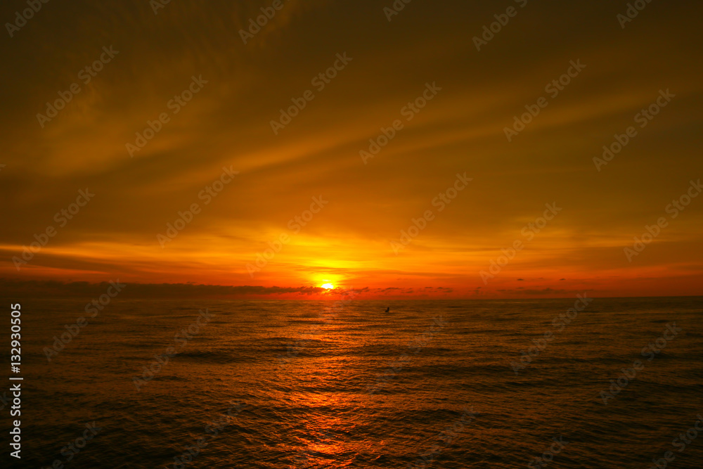 Scenic view of beautiful sunset above the sea. Beautiful cloud texture.