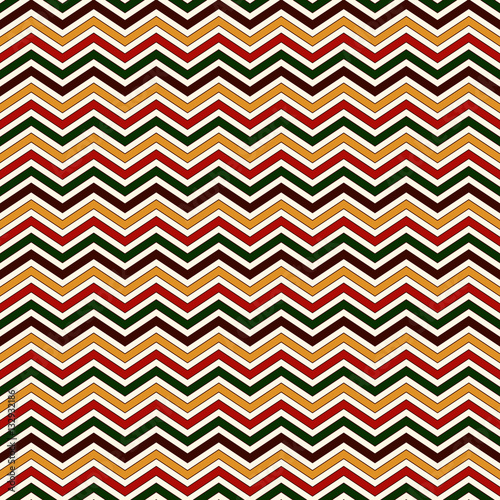 Seamless pattern in Christmas traditional colors. Chevron bright colors diagonal lines abstract background. © funkyplayer