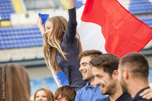 Soccer fans cheering and celebrating
