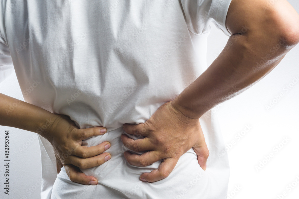A man with back pain A man with back pain