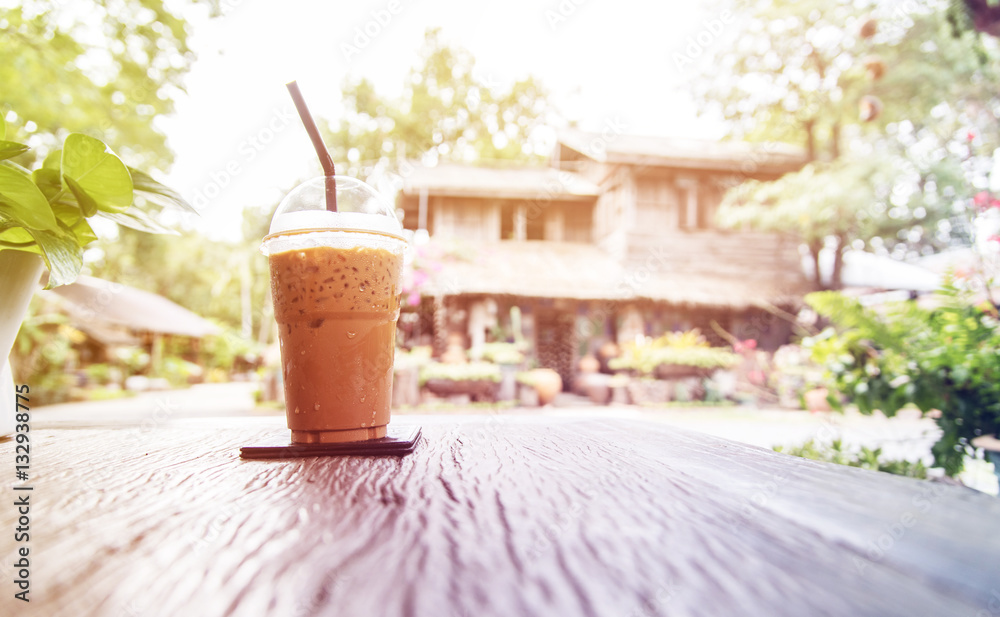 Coffee at relaxation time on wooden table in morning. Vintage co Coffee at relaxation time on wooden table in morning. Vintage co